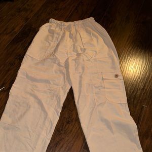 White beach pants. Size M. A bit see through.